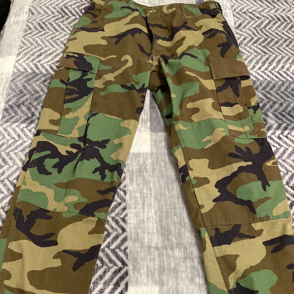 Camouflage Cargo pants size medium short. Can fit a size 12